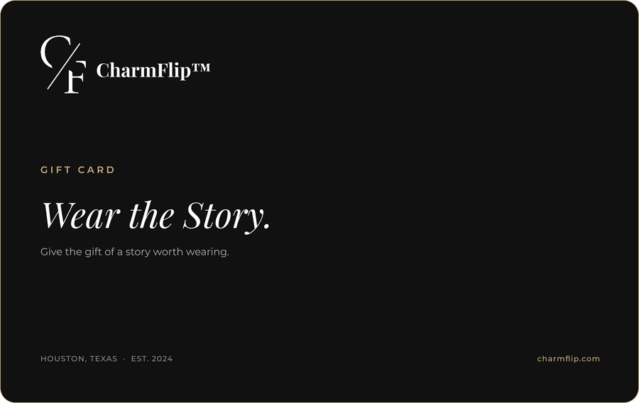 CharmFlip gift card, black and gold design with Wear the Story tagline