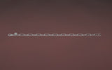 CharmFlip silver 10 inch extender chain rotating 360 degrees on red velvet