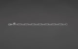 360 degree rotating view of the CharmFlip 8 inch silver paperclip extender chain with lobster clasp, on dark velvet